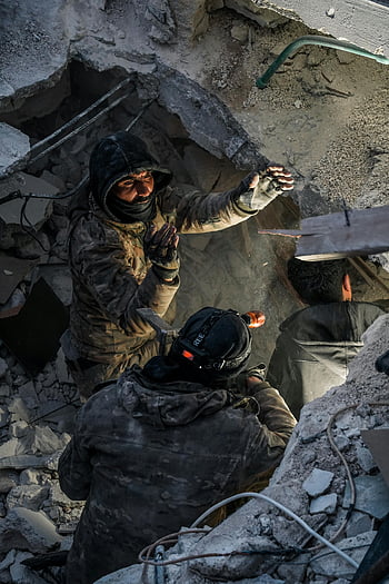 earthquake debris, rescue team, Jindires, Aleppo, saving lives, soldiers, rubble, disaster relief, emergency response, natural disaster, rescue operation