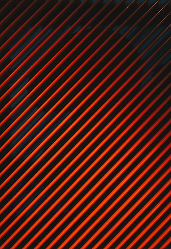red diagonal stripes, abstract pattern, orange stripes, dark background, dynamic design, visual impact, geometric art, modern art, minimalist design, vibrant colors, striking visuals