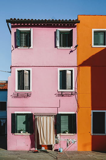 Colored Houses, Venice, Burano island, vibrant painted houses, Italian charm, architecture, pink house, orange house, window shutters, laundry drying, sunny day