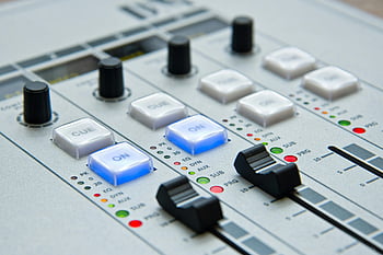 audio mixing console, music mixer, sound control, knobs and buttons, detailed view, white and black mixer, audio equipment, music production, sound mixing, studio equipment, audio interface