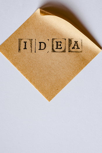 idee, gestempelde brieven, bruin papier, minimalistische, detailopname, Rustieke esthetiek, Notitie, postzegel, structuur, ontwerp, creativiteit