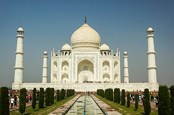 Taj Mahal, Agra, India, Islamic architecture, clear sky, iconic landmark, white marble, domed structure, minarets, tourist attraction, historical monument