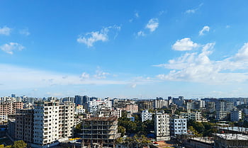 Dhaka cityscape, urban architecture, blue sky, panoramic view, vibrant sky, city buildings, Dhaka skyline, urban skyline, city panorama, urban landscape, city view