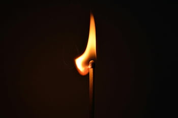 burning match, lighted match, close-up image, dark background, fire details, matchstick flame, captivating photo, light and fire, matchstick in dark, burning matchstick, fire photography