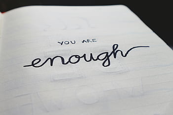motivational text, notebook page, handwritten text, you are enough, close-up photo, inspirational quote, positive message, self-affirmation, personal growth, mental health, handwriting style