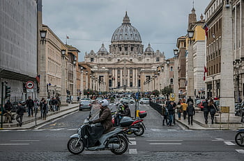 St. Peter's Basilica, Rome, street life, vibrant streets, motorbikes, pedestrians, historic architecture, Italian culture, urban scene, European city, travel destination