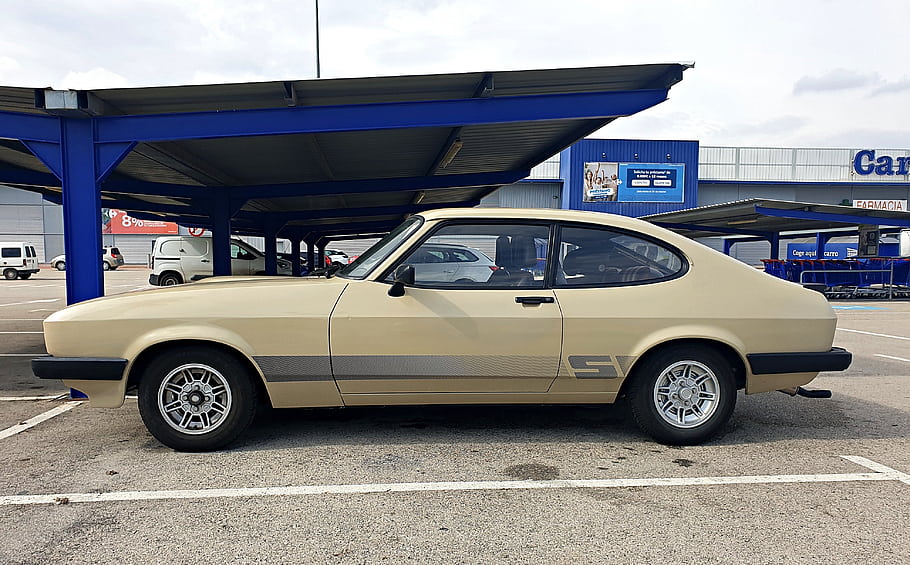 Ford Capri, 2.0 S, classic car, beige color, side view, parking lot, blue canopy, vintage vehicle, European car, retro design, wheels