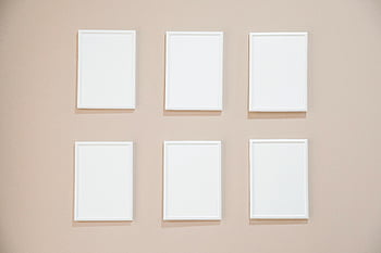 white empty frames, pastel wall, design mockups, six white frames, wall arrangement, empty picture frames, white frames, pastel background, frame mockup, wall decor, minimalist design