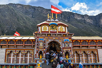 Shree Badrinath Temple, India, pilgrims, mountainous backdrop, vibrant view, temple architecture, religious site, travel destination, cultural landmark, Hindu temple, scenic landscape