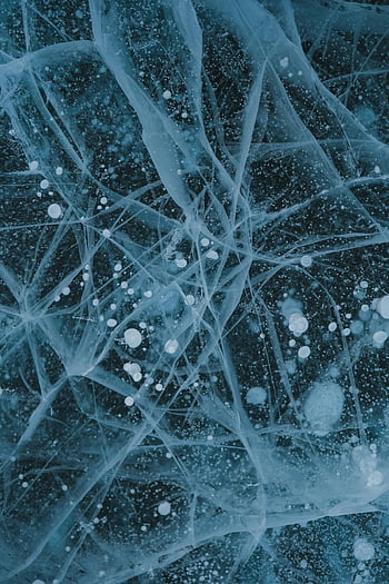 icy lake, abstract background, wavy surface, natural ice patterns, Lake Baikal, frozen structures, serene blue, ice bubbles, winter landscape, frozen lake, ice formations