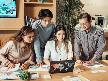 group meeting, office collaboration, diverse professionals, modern office, laptop discussion, business team, workplace interaction, professional meeting, office setting, team collaboration, business people