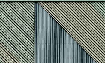 metal wall, diagonal pattern, texture design, close-up, unique texture, metal surface, architectural detail, industrial design, modern architecture, wall texture, patterned wall