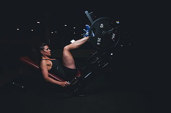 woman, leg press, gym workout, strength training, fitness, barbell, exercise, intense workout, physical activity, health, wellness