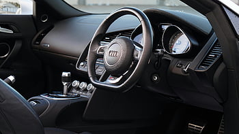 audi r8, Musta Audi -ohjauspyörä, tyylikäs sisustus, urheiluauton kojelauta, audi sisustus, ylellinen auton sisustus, auton ohjauspyörä, kojelaudan suunnittelu, Audi R8:n sisustus, Auton sisustussuunnittelu, urheiluauton ohjauspyörä